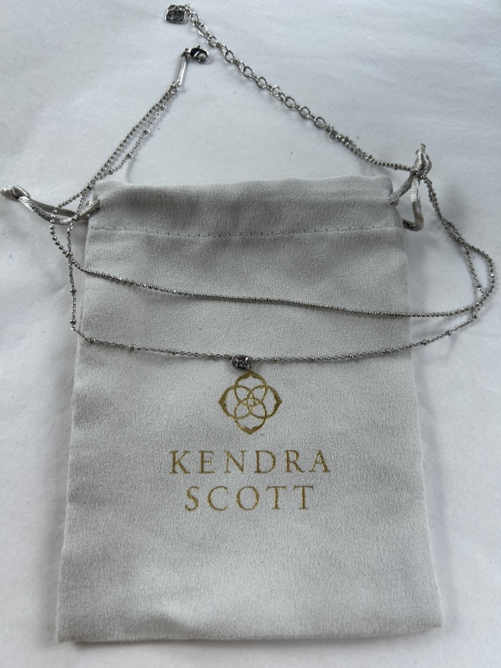 Kendra Scott 18” double strand silver necklace with faux diamond pendant